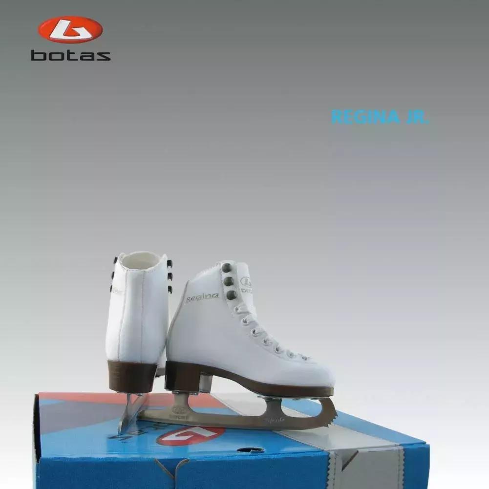Botas Regina Jr. white figure skates, pair standing on the Botas box – the junior version of the Regina
