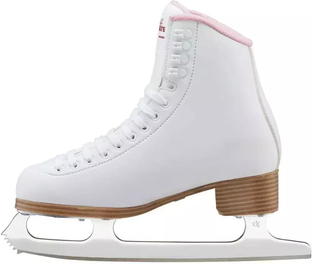 Side view of the white Jackson SoftSkate 380 with pink trim, showing the tan sole, stacked heel and white Ultima Mark I blade
