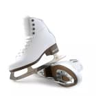 BOTAS Cindy Women’s and Girls’ Figure Skates 13 BOTAS Cindy figure skates angled to show the brown plastic sole, stacked heel and screw-mounted blade plates