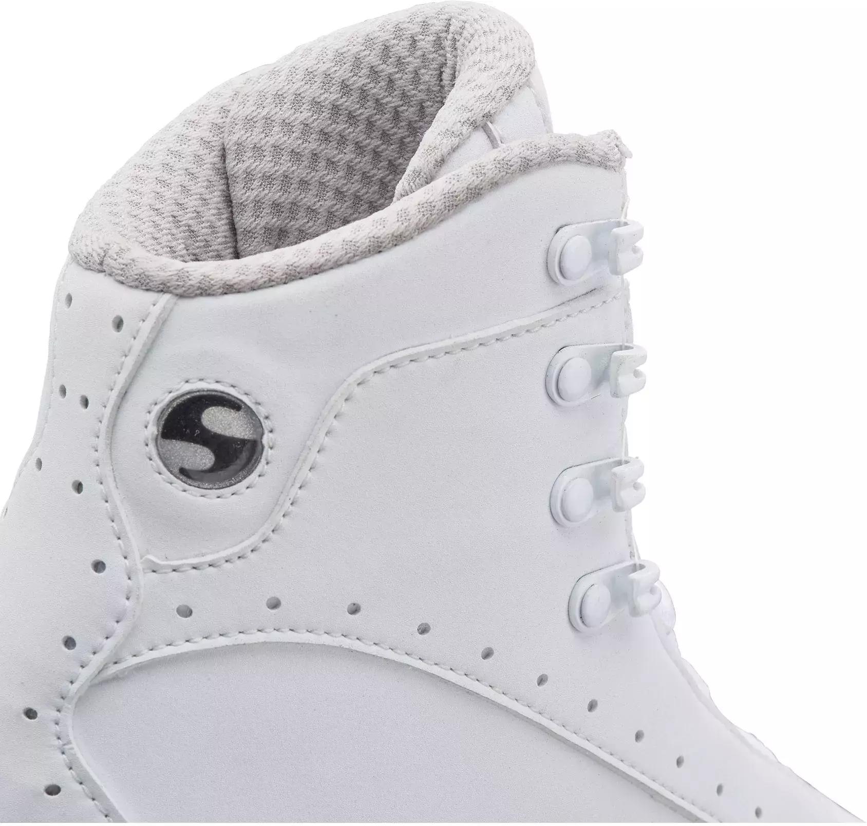 Jackson Ultima Softec Elite ST7200 Women’s Ice Skates / White 10 Close-up of the white Softec Elite ST7200 lace hooks, round Softec badge, punched vent holes and gray knit collar