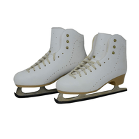 Belati Primula beginner figure skates in white with beige soles and Botas Nicole blades