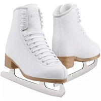 Pair of Jackson Ultima Classic 200 white figure skates with antique tan soles and Ultima Mark I blades