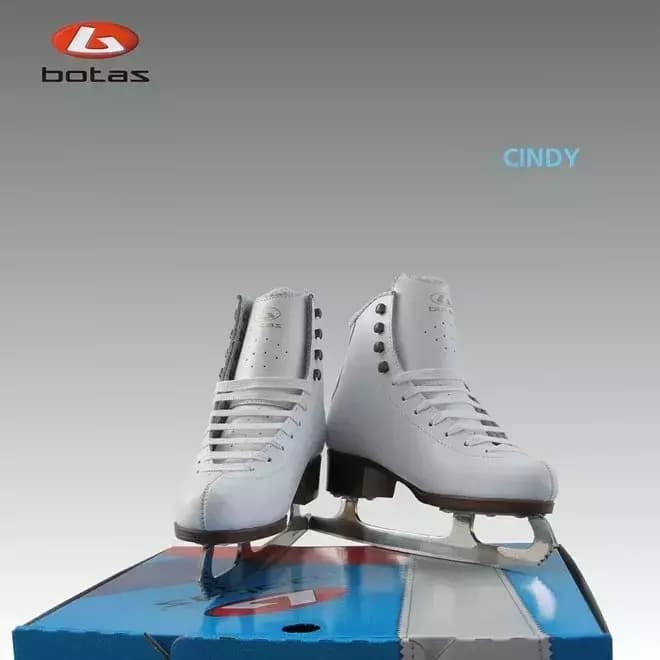 BOTAS Cindy Women’s and Girls’ Figure Skates 2 Pair of BOTAS Cindy white figure skates standing on a Botas box