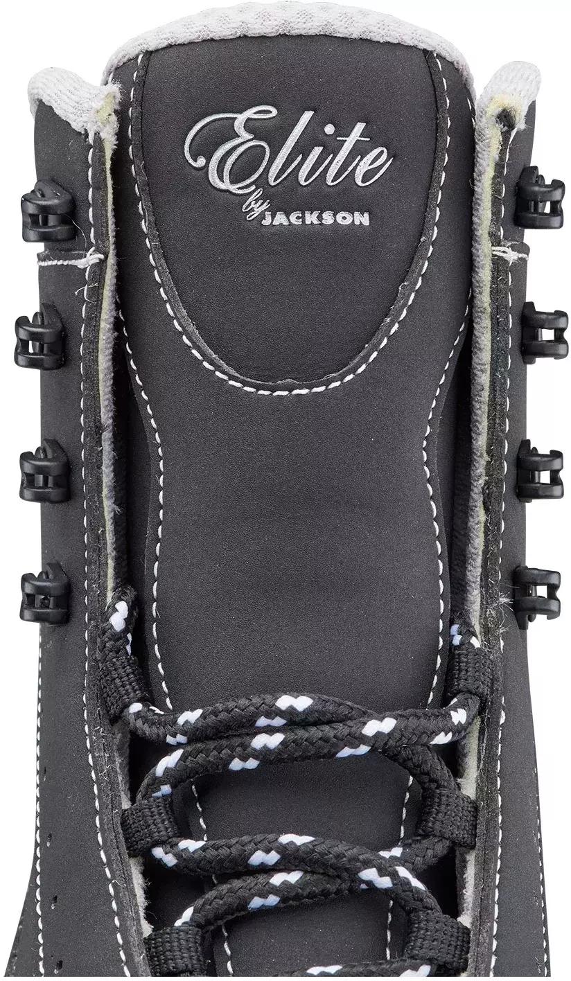 Close-up of the Softec Elite ST7200 padded tongue with the Elite by Jackson logo and four open lace hooks each side