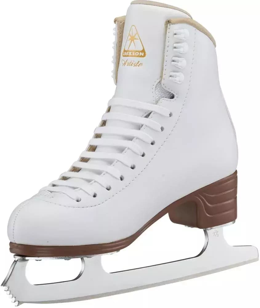 Jackson Ultima Artiste JS1790 Women’s and Girls’ Figure Skates 3 Jackson Ultima Artiste JS1790 figure skate, angled inside view: gold Jackson Artiste logo on the tongue, white laces and hooks, brown stacked-look heel, toe pick